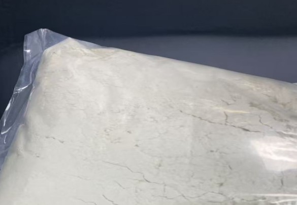 2-(6-Amino-5-bromo-3-pyridazinyl)phenol