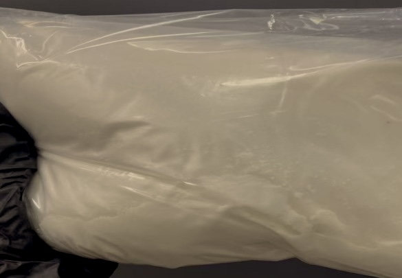 3-(2-(2-(2-((4-((3-Chloro-4-fluorophenyl)amino)-7-methoxyquinazolin-6-yl)oxy)ethoxy)ethoxy)ethoxy)propanoic acid